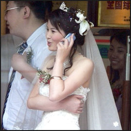 20080225-Chinabride on cell phone textuallyspeaking com.jpg